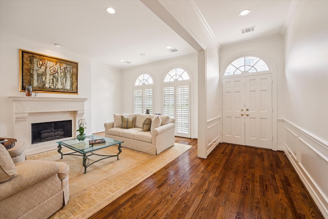 2214 Potomac Dr Unit 2, Houston, TX 77057 - living area featuring crown molding, dark wood-style flooring, recessed lighting, and a fireplace