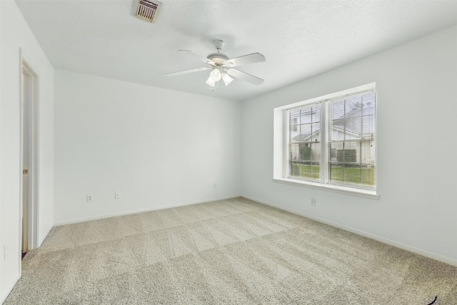 2079 Country Village Blvd Unit C, Humble, TX 77338 - empty room with a ceiling fan, light carpet, and baseboards