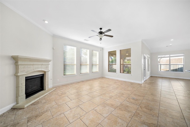 27910 Wedgeoak Ct, Katy, TX 77494 - unfurnished living room with a ceiling fan, a premium fireplace, baseboards, ornamental molding, and recessed lighting