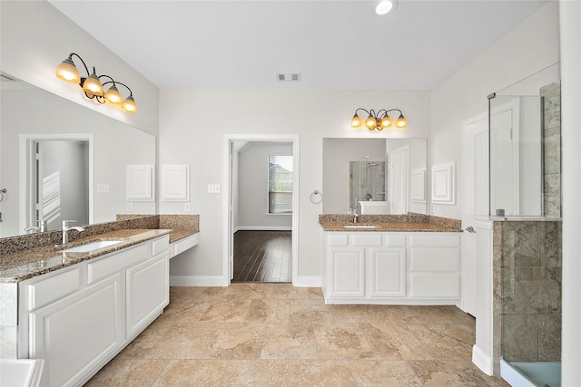 27910 Wedgeoak Ct, Katy, TX 77494 - full bath featuring baseboards, two vanities, and a shower stall