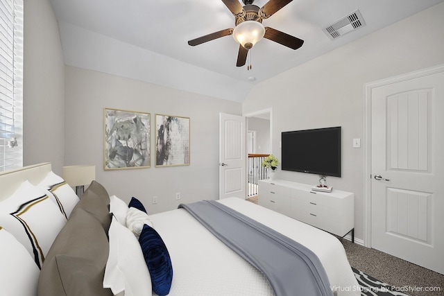 27910 Wedgeoak Ct, Katy, TX 77494 - carpeted bedroom featuring lofted ceiling, multiple windows, and ceiling fan