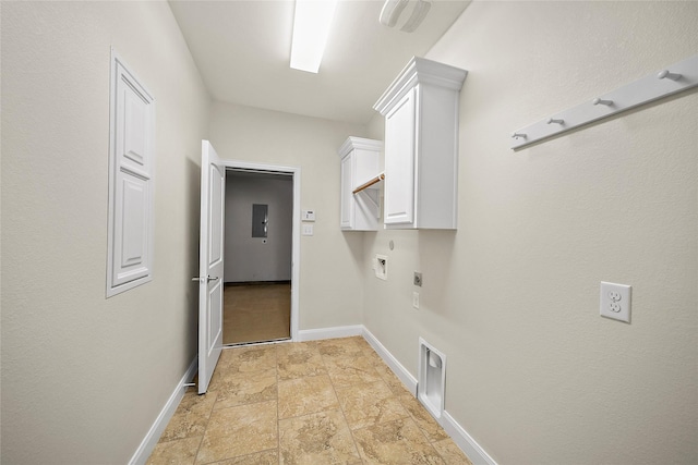 27910 Wedgeoak Ct, Katy, TX 77494 - laundry room featuring hookup for an electric dryer, cabinet space, light stone finish floors, and baseboards
