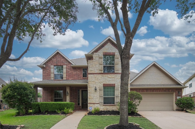 27910 Wedgeoak Ct, Katy, TX 77494 - view of front facade featuring an attached garage, stone siding, a front yard, and driveway