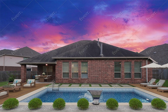 27910 Wedgeoak Ct, Katy, TX 77494 - back of house with a deck, brick siding, and a shingled roof
