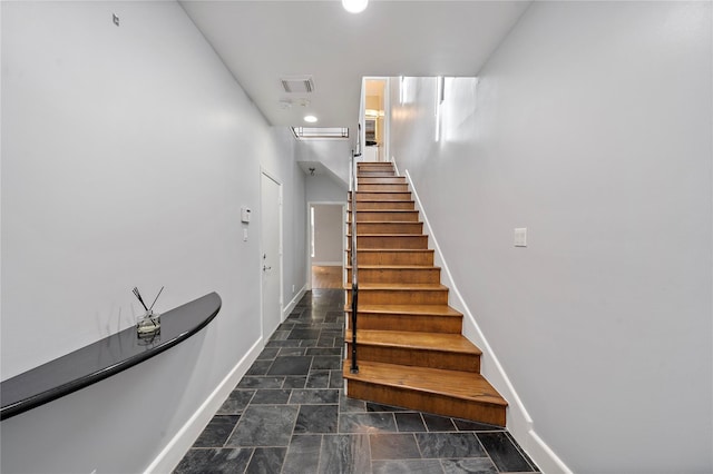 1822 Brun St, Houston, TX 77019 - staircase featuring baseboards