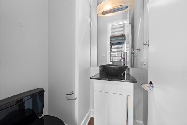 1822 Brun St, Houston, TX 77019 - bathroom featuring vanity and baseboards