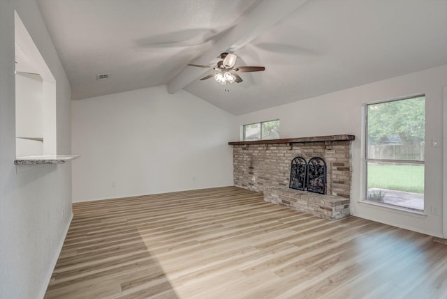 1041 Crossing Rd, Angleton, TX 77515 - unfurnished living room featuring wood finished floors, a brick fireplace, and a ceiling fan