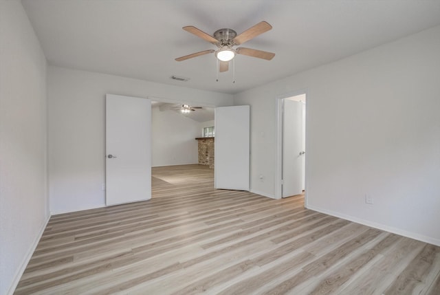 1041 Crossing Rd, Angleton, TX 77515 - unfurnished room with a ceiling fan and light wood finished floors
