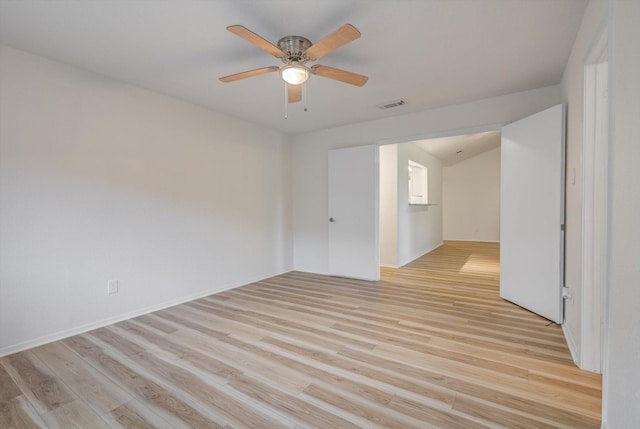 1041 Crossing Rd, Angleton, TX 77515 - empty room with light wood-style flooring and a ceiling fan