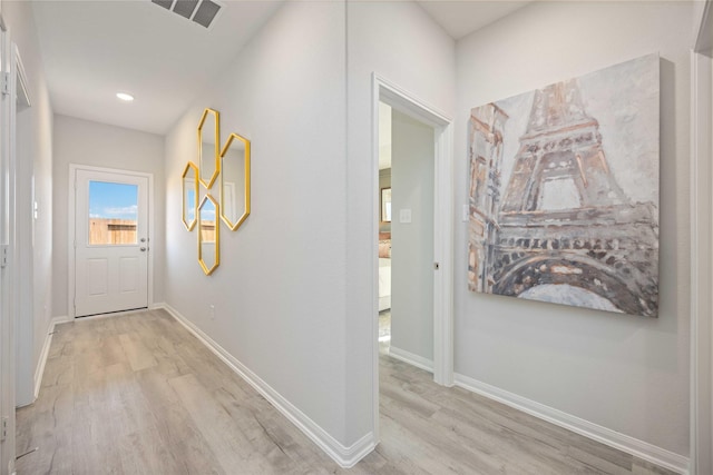 11745 Whirlaway Dr, Willis, TX 77318 - hallway featuring light wood-style flooring, baseboards, and recessed lighting