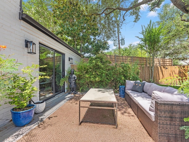 15722 Island Grove Ct, Houston, TX 77079 - view of patio with an outdoor hangout area