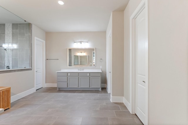 5807 Yango Terrace Ln, Sugar Land, TX 77479 - full bathroom featuring vanity, baseboards, and recessed lighting