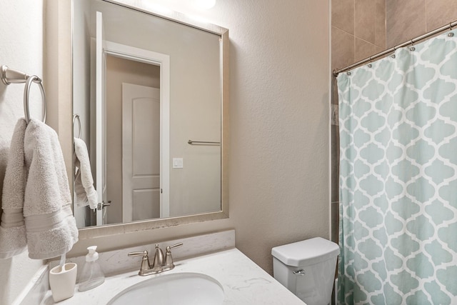 5807 Yango Terrace Ln, Sugar Land, TX 77479 - bathroom featuring vanity, toilet, and curtained shower