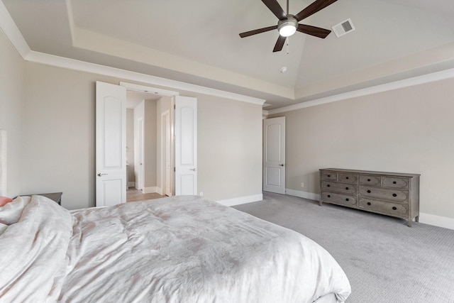 5807 Yango Terrace Ln, Sugar Land, TX 77479 - carpeted bedroom with baseboards, a ceiling fan, lofted ceiling, and a raised ceiling