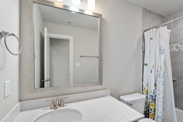 5807 Yango Terrace Ln, Sugar Land, TX 77479 - full bathroom with toilet, vanity, and shower / bath combo with shower curtain