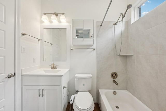 25306 Hollowgate Park Ln, Tomball, TX 77375 - bathroom with toilet, vanity, and bathtub / shower combination