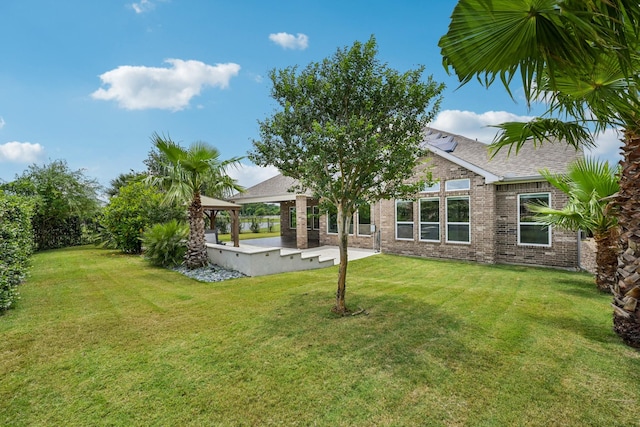25306 Hollowgate Park Ln, Tomball, TX 77375 - view of green lawn with a gazebo and a patio area