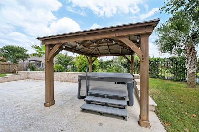 25306 Hollowgate Park Ln, Tomball, TX 77375 - view of patio with a hot tub and a gazebo