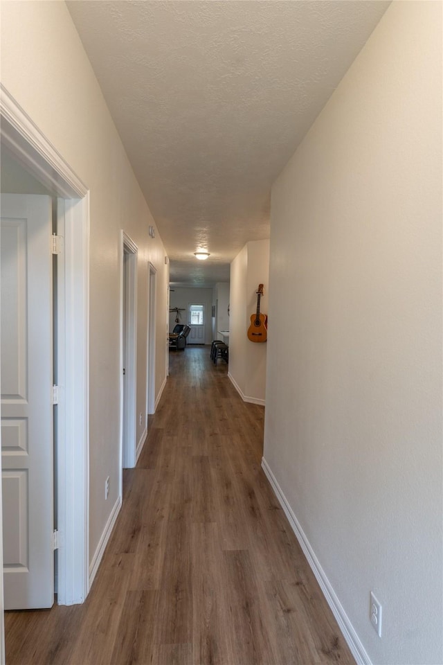 3017 Cambridge Meadows Ln, Dickinson, TX 77539 - corridor with wood finished floors and baseboards