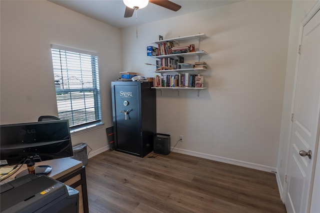 3017 Cambridge Meadows Ln, Dickinson, TX 77539 - home office with ceiling fan, plenty of natural light, wood finished floors, and baseboards