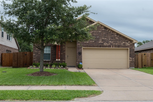 3017 Cambridge Meadows Ln, Dickinson, TX 77539 - view of front of house with brick siding, concrete driveway, and an attached garage
