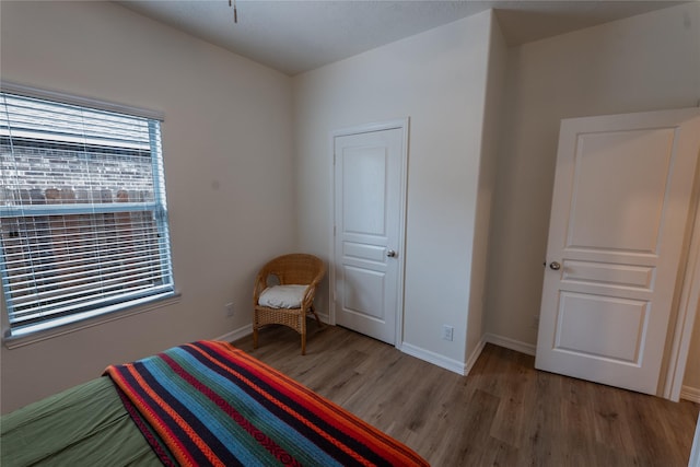 3017 Cambridge Meadows Ln, Dickinson, TX 77539 - bedroom with light wood-style floors and baseboards