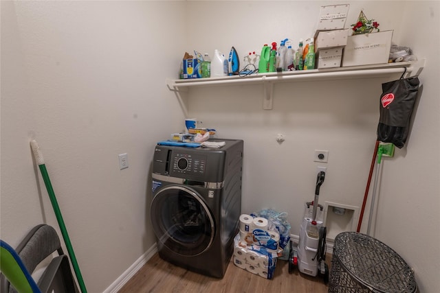 3017 Cambridge Meadows Ln, Dickinson, TX 77539 - laundry area featuring washer / clothes dryer and wood finished floors
