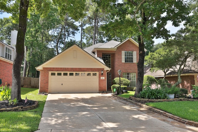 19 Almond Branch Pl, The Woodlands, TX 77382 - traditional-style house featuring driveway, an attached garage, and brick siding