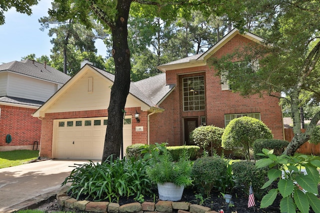 19 Almond Branch Pl, The Woodlands, TX 77382 - traditional-style home featuring a garage, brick siding, and concrete driveway
