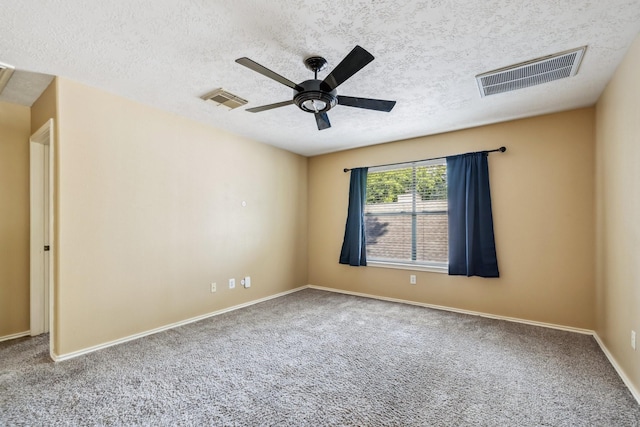 19 Almond Branch Pl, The Woodlands, TX 77382 - empty room featuring carpet flooring, a ceiling fan, a textured ceiling, and baseboards