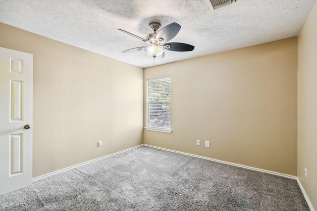 19 Almond Branch Pl, The Woodlands, TX 77382 - spare room featuring ceiling fan, carpet floors, baseboards, and a textured ceiling