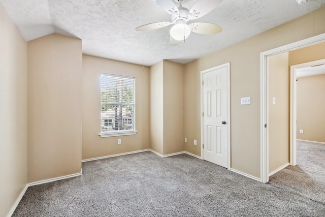 19 Almond Branch Pl, The Woodlands, TX 77382 - unfurnished bedroom with carpet, a textured ceiling, baseboards, and a ceiling fan