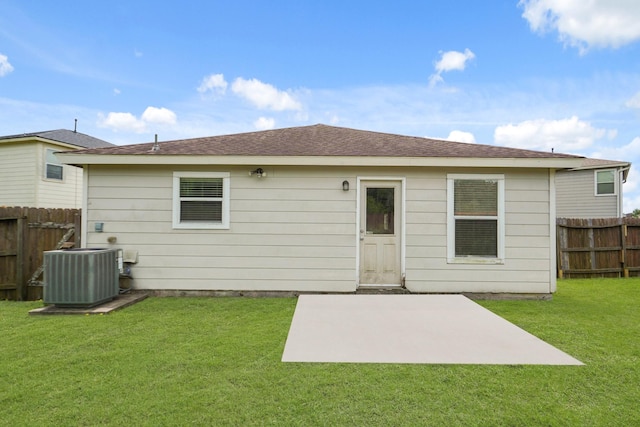 7339 Liberty Tree Ln, Houston, TX 77049 - back of house featuring central AC and a patio area