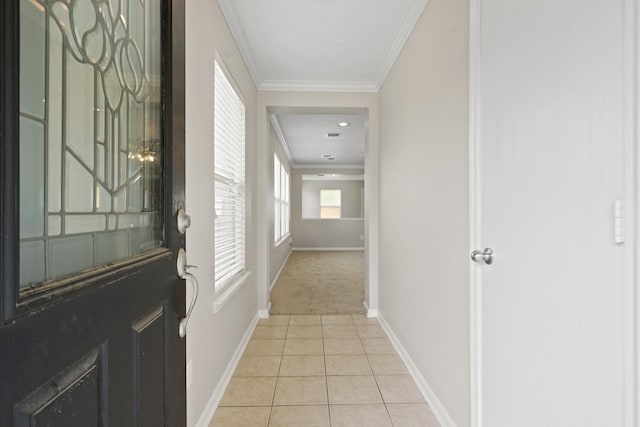 7339 Liberty Tree Ln, Houston, TX 77049 - hall featuring baseboards, crown molding, light tile patterned floors, and light colored carpet