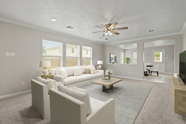 7339 Liberty Tree Ln, Houston, TX 77049 - living room with light carpet, ornamental molding, ceiling fan, baseboards, and recessed lighting