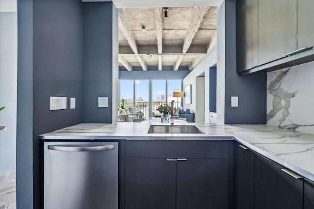 3614 Montrose Blvd Unit 704, Houston, TX 77006 - kitchen with stainless steel dishwasher, open floor plan, light stone countertops, and modern cabinets