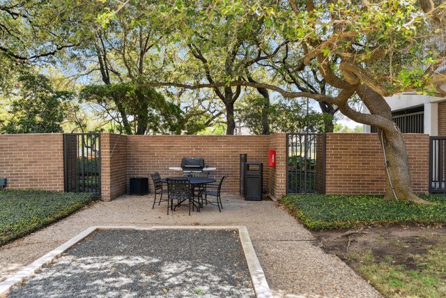 3614 Montrose Blvd Unit 704, Houston, TX 77006 - view of patio / terrace featuring a gate