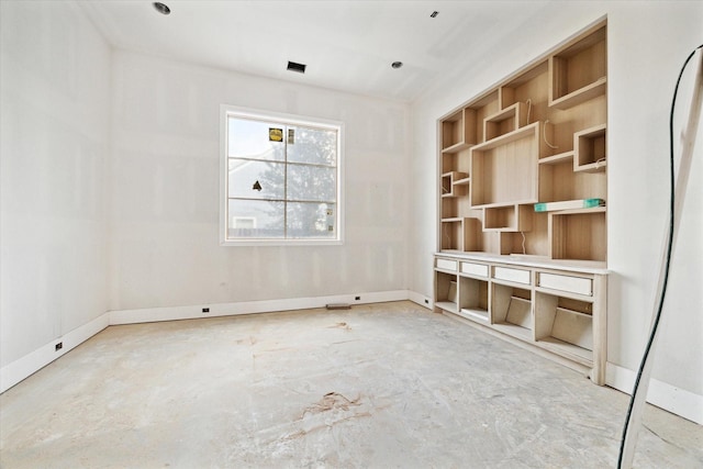 830 Azalea St, Houston, TX 77018 - empty room with unfinished concrete floors and baseboards