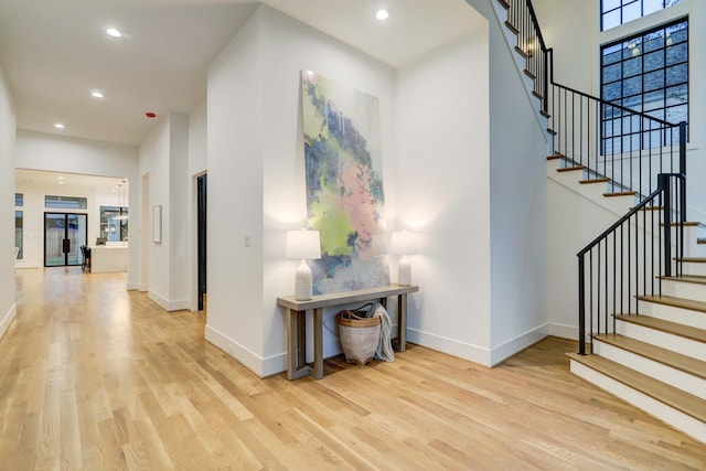 830 Azalea St, Houston, TX 77018 - foyer featuring wood finished floors, recessed lighting, baseboards, stairway, and a towering ceiling