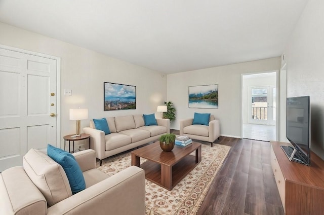 4040 San Felipe St Unit 246, Houston, TX 77027 - living room featuring dark wood-type flooring and baseboards