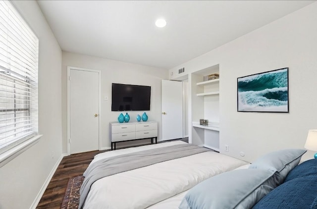 4040 San Felipe St Unit 246, Houston, TX 77027 - bedroom with wood finished floors and baseboards