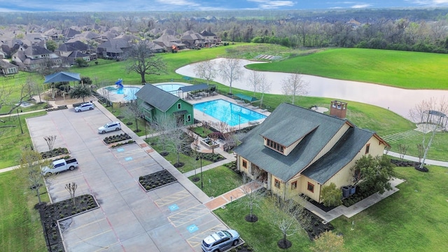 5106 Green Leaf Ln, Fulshear, TX 77441 - bird's eye view of a pool area and a large body of water