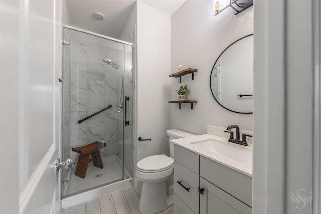 5106 Green Leaf Ln, Fulshear, TX 77441 - bathroom featuring a marble finish shower, vanity, and toilet