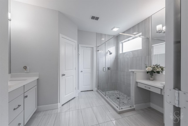 5106 Green Leaf Ln, Fulshear, TX 77441 - bathroom featuring a shower stall, vanity, baseboards, and tile patterned flooring