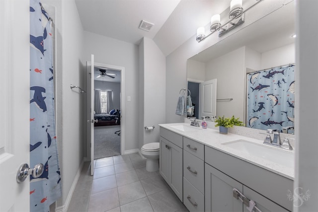 5106 Green Leaf Ln, Fulshear, TX 77441 - bathroom with double vanity, toilet, baseboards, tile patterned floors, and ceiling fan
