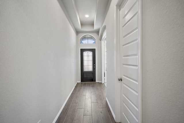 229 N Bearkat Ct, Montgomery, TX 77316 - doorway featuring dark wood-style flooring and baseboards