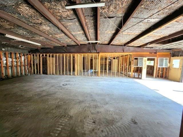 610 New York St, Navasota, TX 77868 - miscellaneous room with unfinished concrete flooring