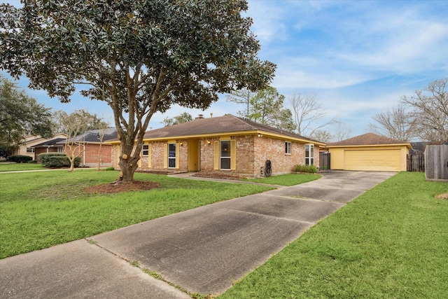 507 Williamsport St, League City, TX 77573 - single story home with brick siding, concrete driveway, a detached garage, a shingled roof, and a chimney