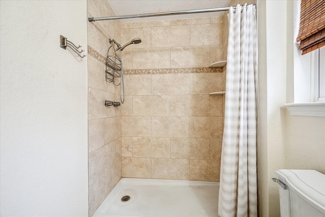 507 Williamsport St, League City, TX 77573 - bathroom featuring toilet and a tile shower