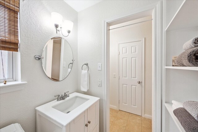 507 Williamsport St, League City, TX 77573 - bathroom featuring vanity, tile patterned floors, and toilet
